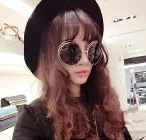 Detailed view of oversized hollow double metal frame sunglasses with gradient lenses