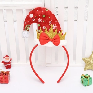 Detail of red Christmas headband with gold glitter crown and snowflake pattern