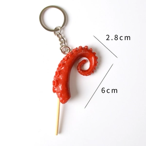 Realistic octopus tentacle barbecue skewer keychain with suction cup details for bag decor