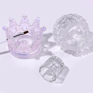 Clear octagonal crystal glass nail art cup set with purple crown container on white background