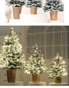 Three sizes of PE flocked Christmas trees in bronze pots with warm LED fairy lights