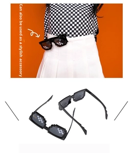Black pixelated mosaic sunglasses shown as both a stylish waist accessory and eyewear