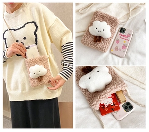 Detail of cute lamb wool cloud phone bag showing interior capacity and crossbody strap