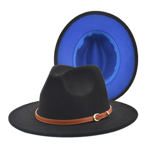 Detailed view of bicolor fedora wool hat with black crown and vibrant blue brim lining