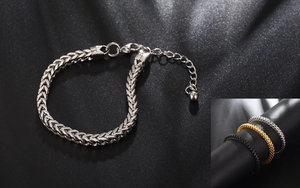 Macro detail of stainless steel wheat chain bracelet in silver with lobster clasp