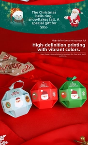 Detailed view of creative polyhedral Christmas candy boxes with festive prints and silk handles