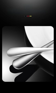 Detail of SUS 304 food grade stainless steel spoon handle with brushed metal texture