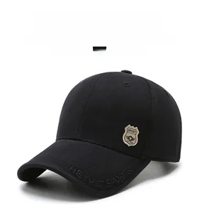 Detail of SPORT badge and HEYHAT SPORTS embossed lettering on black cotton baseball cap