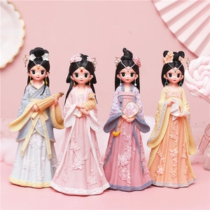 Detailed view of four cute Chinese Hanfu girl figurines with various traditional props