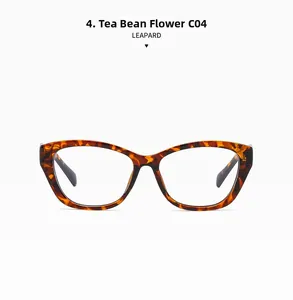 Detail view of cat eye glasses frames in tortoise pattern with metal hinge structure