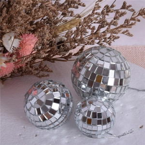 Three-piece set of silver disco mirror balls with reflective glass tiles for decor