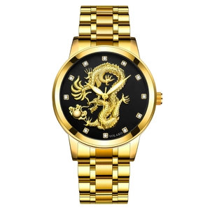 Golden quartz watch with dragon pattern relief and crystal markers on black dial