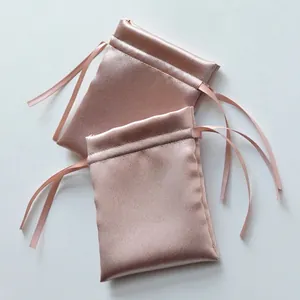 Champagne rose gold satin drawstring gift bags for wedding favors and jewelry storage