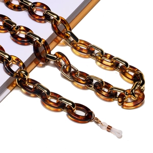 Chaîne de lunettes tendance en acrylique léopard et métal doré avec boucles antidérapantes
