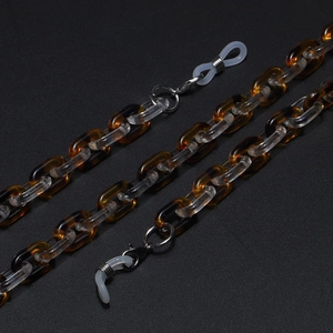 Detail of amber leopard print acrylic eyeglass chain with clear links and anti-slip loops