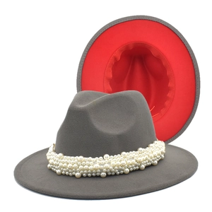 Detail of grey wool fedora with red brim interior and elegant pearl bead hatband
