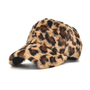 Detailed shot of soft leopard print faux fur texture on a warm winter baseball cap