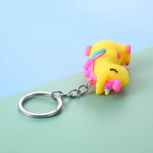 Cute yellow unicorn PVC keychain with pink mane and silver metal ring for bags and keys