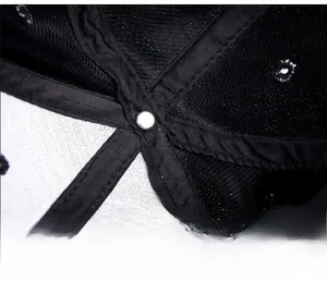 Close-up of the breathable mesh interior and reinforced stitching of the baseball cap