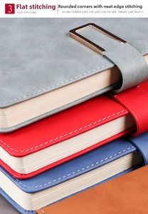 Detailed macro view showing the neat white stitching and metal buckle on PU leather notebook