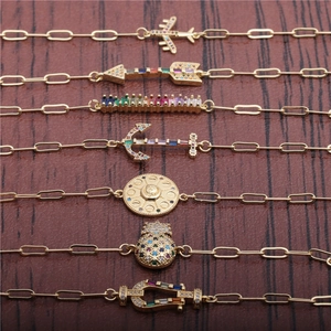 Hip hop gold Cuban bracelets featuring colorful zircon arrows and geometric pendants