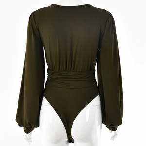 Detail of olive green bodysuit featuring long lantern sleeves and a ruched waist design