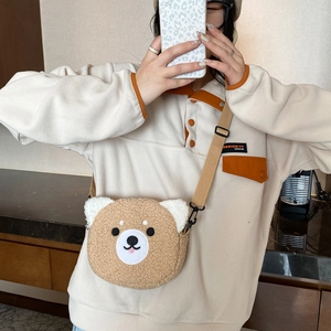 Cute brown plush bear crossbody bag with adjustable strap and soft sherpa material