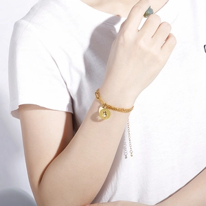 Gold double chain bracelet with hollow girl pattern charms for women and girls