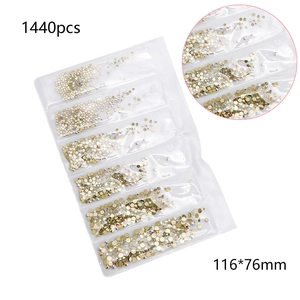 Detail view of 1440pcs multi-faceted crystal glass rhinestones in a six-grid package