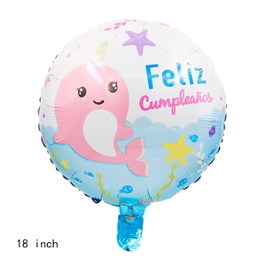 18 inch round Spanish Happy Birthday foil balloon with cute narwhal and sea elements
