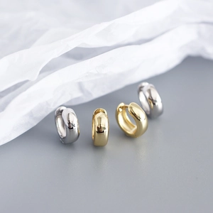 Polished S925 sterling silver huggie earrings in gold and silver finish