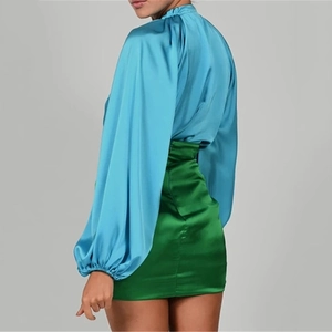 Blue satin high neck shirt and green mini skirt two-piece set for women back view