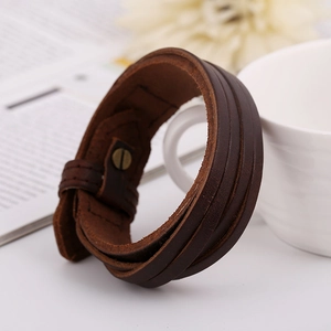 Vintage layered brown leather bracelet for men with textured weave and antique metal clasp