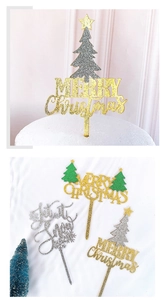 Glittery Merry Christmas cake toppers with gold silver trees and snowflakes