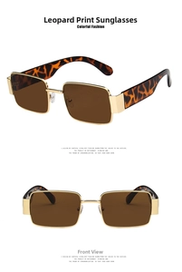 Detailed view of square gold metal sunglasses with leopard print temples and brown lenses