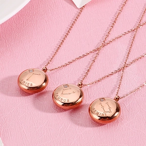 Rose gold zodiac pendant necklaces with Aries, Taurus, and Gemini signs and rhinestones
