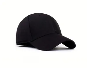 Close-up of structured black baseball cap showing breathable honeycomb mesh fabric texture