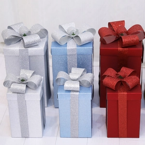 Glitter matte Christmas gift boxes with bows in red blue and silver for holiday decor