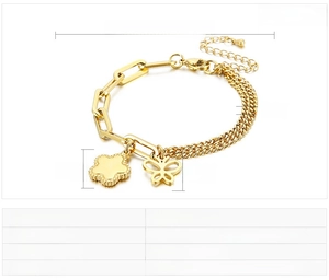 Vista dettagliata del bracciale in acciaio inossidabile dorato con fiori e farfalle