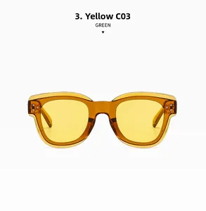 Detailed view of vintage amber yellow square sunglasses with classic metal rivet hinges