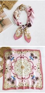 Pink printed silk scarf featuring carriage and baroque patterns tied on a straw bag