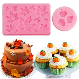 Pink silicone pumpkin and maple leaf baking molds with 3D finished chocolate cakes