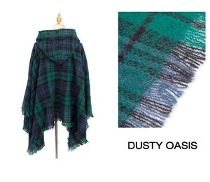 Detail view of plaid hooded poncho featuring blue and green knit fabric with long fringe trim