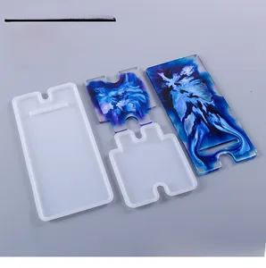 Macro view of DIY phone stand silicone molds with purple resin art finished pieces