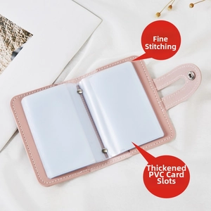 Detail of pink leather card holder with fine stitching and thickened PVC slots