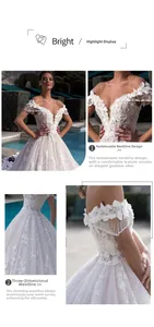 Detail of wedding dress with 3D floral lace, tassel shoulders and cinched waistline