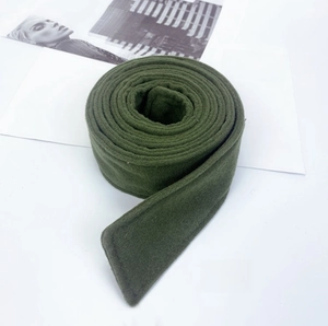 Detailed macro view of army green wool fabric belt with soft brushed texture