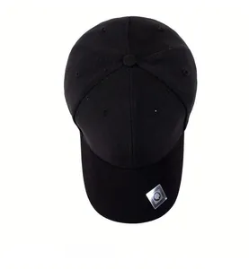 Top view of a black baseball cap with six-panel construction and silver logo sticker