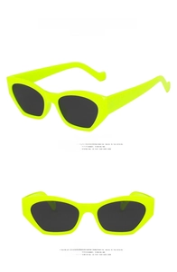 Detailed front and side views of fluorescent green cat eye sunglasses with gray lenses