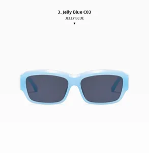 Detail view of rectangular jelly blue sunglasses with C03 dark lenses and resin frame